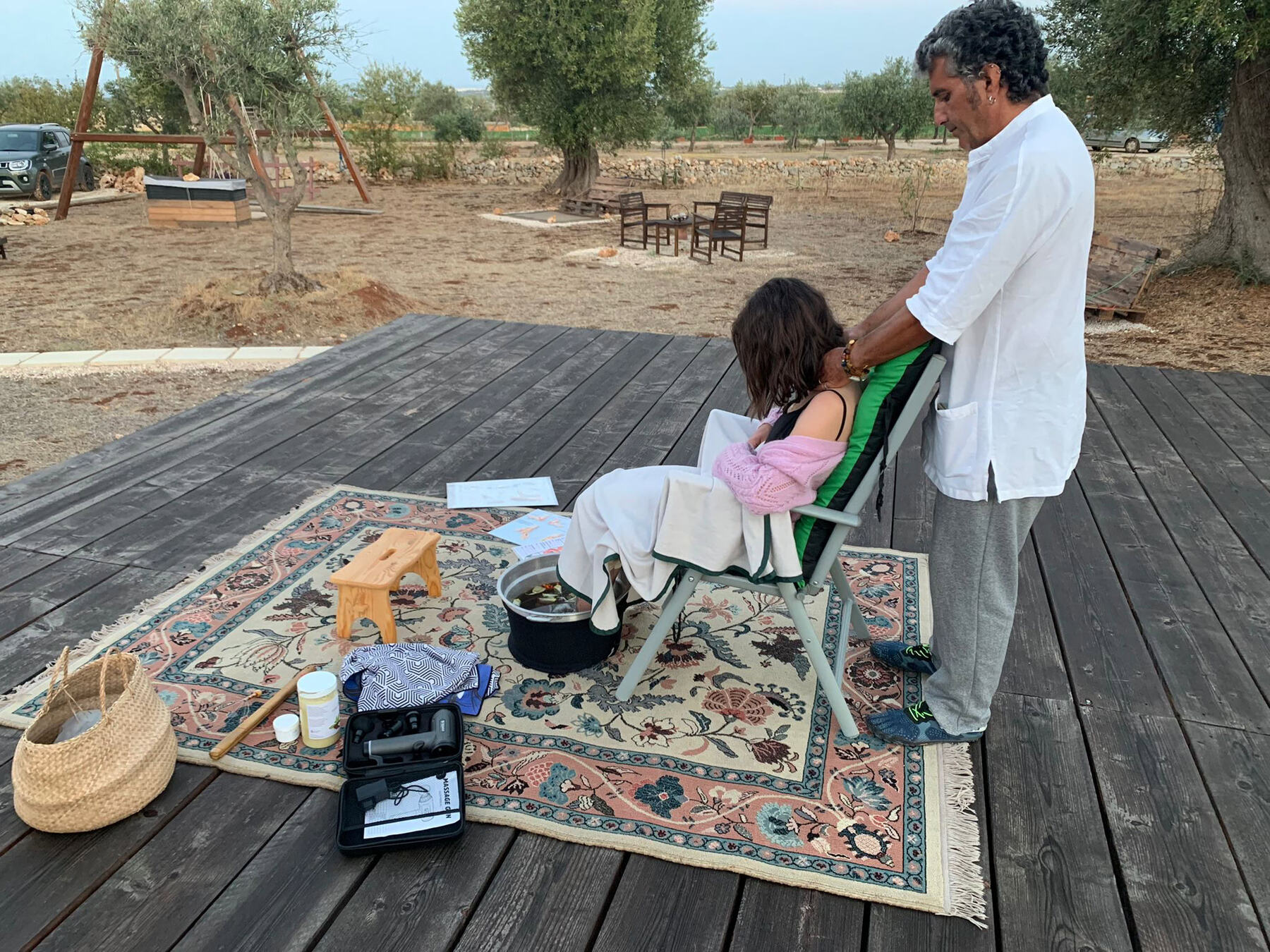 Treatment on the wooden deck among the olive trees of Bibiland
