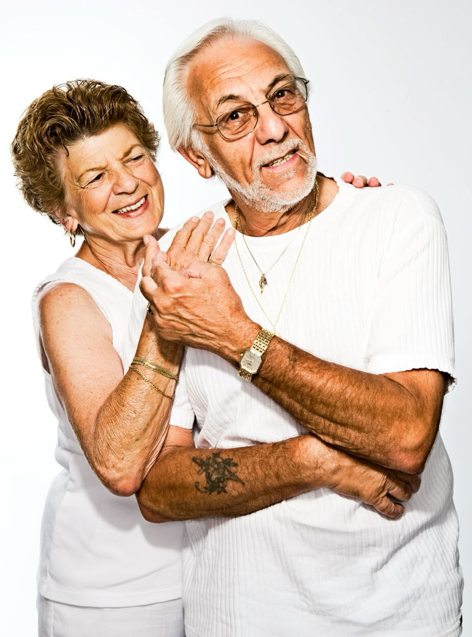 A smiling elderly couple